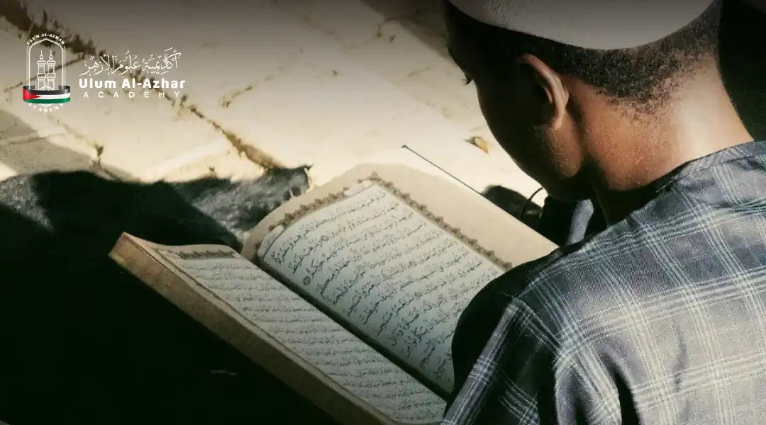 A Muslim man reads from the Qur’an to feel the greatness of Allah.
